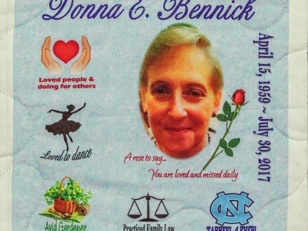 Quilt square for Donna Bennick with a photo of Donna and patches with text reading: Loved people & doing for others, loved to dance, avid gardener, practiced family law, tarheel 4 ever.