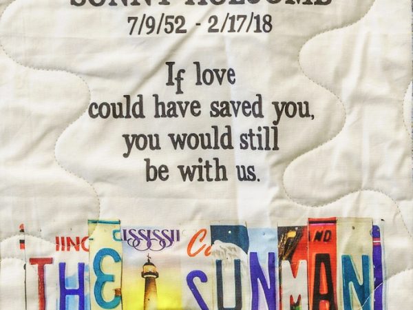 Quilt square for Lawrence Holocomb with text reading: If love could have saved you, you would still be with us. The sunman.