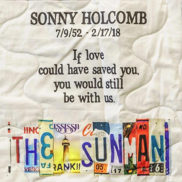 Quilt square for Lawrence Holocomb with text reading: If love could have saved you, you would still be with us. The sunman.