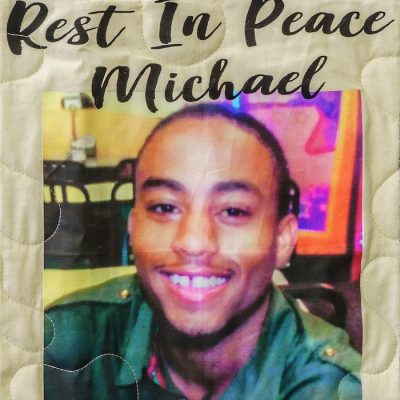 Quilt square for Michael Richardson with a photo of Michael and text reading: rest in peace.