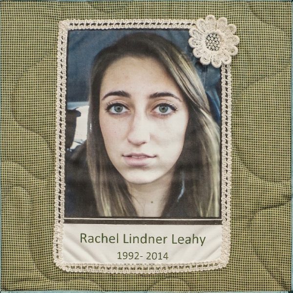 Quilt square for Rachel Lindner Leahy with a photo of Rachel and a patch of a flower in corner