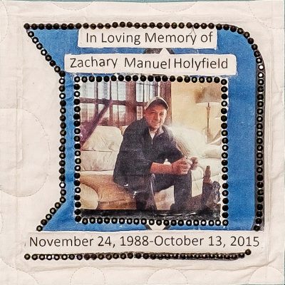 Quilt square for Zachary Manuel Holyfield with a photo of Zachary at the center