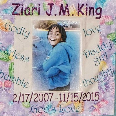 Quilt square for Ziari King with a photo of Ziari at the center with text on the sides reading: love, daddy’s girl, thoughtful, humble, fearless, Godly.