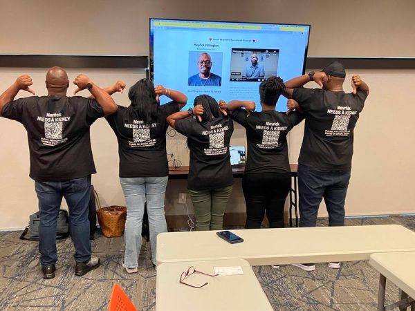 family wearing matching shirts